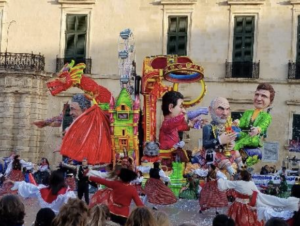 Fig. 4: Carnivale in Valletta, Malta–a parade float and dancers
